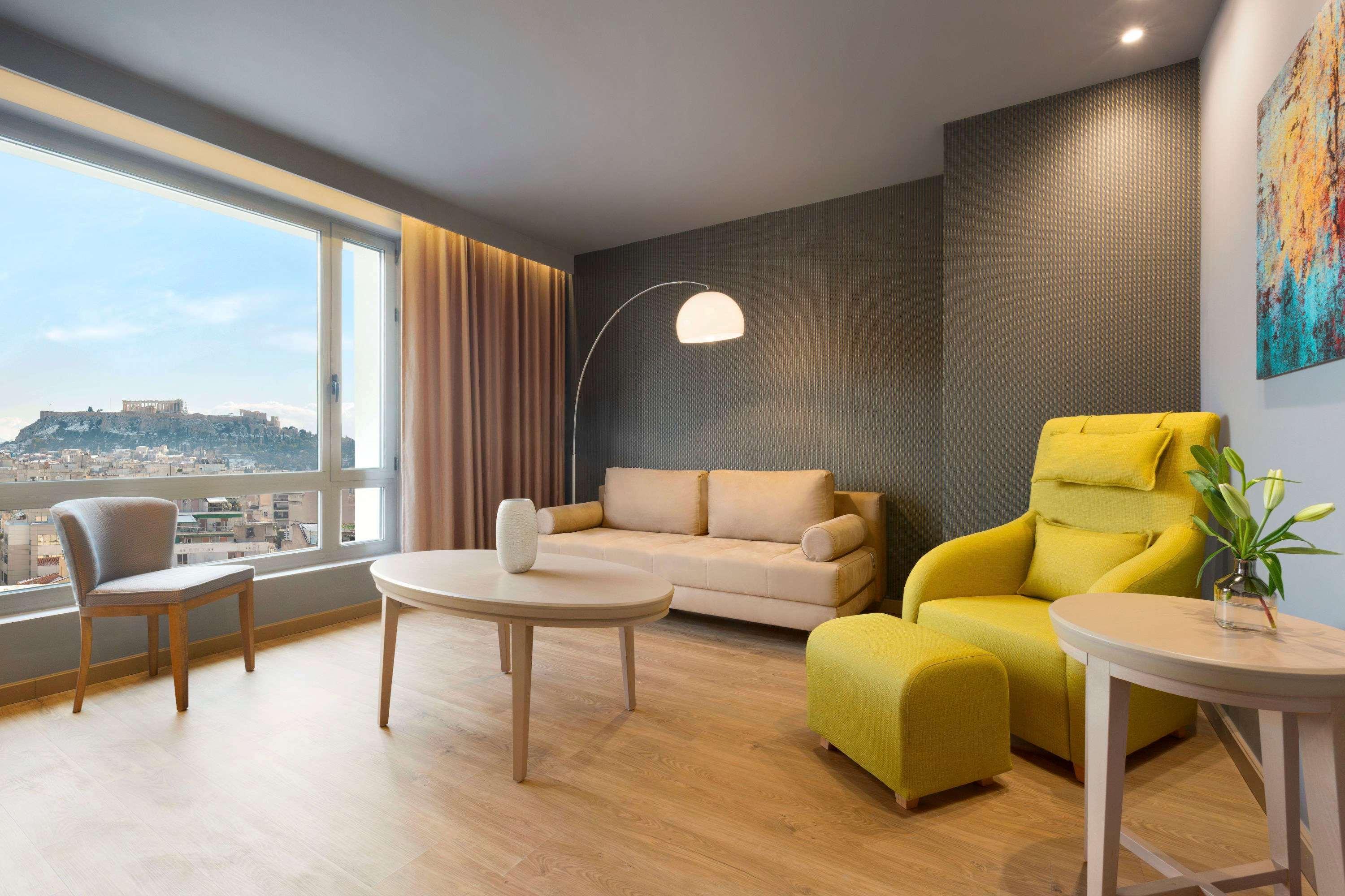 Hotel Wyndham Grand Atene Esterno foto A living room