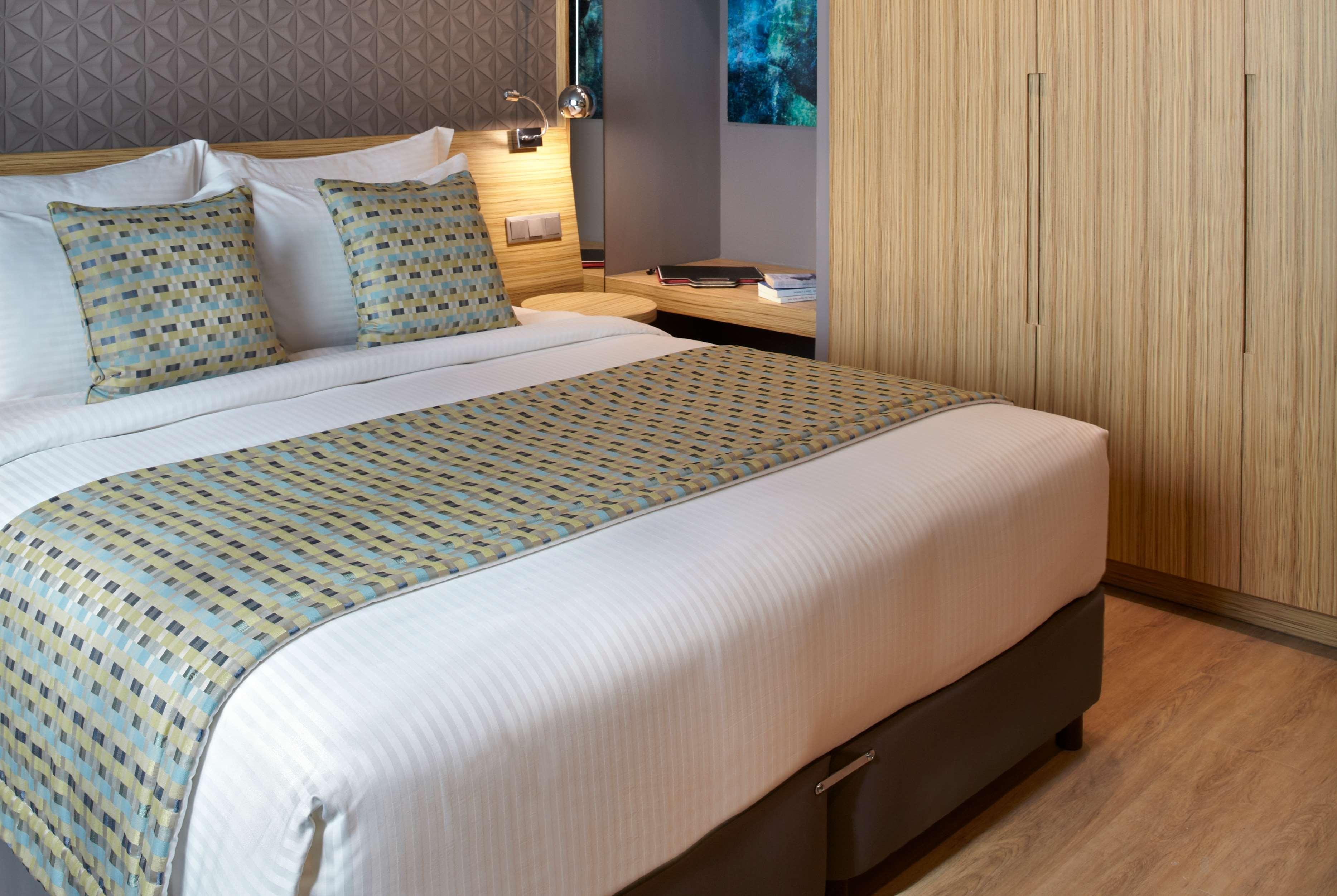 Hotel Wyndham Grand Atene Esterno foto A bed runner