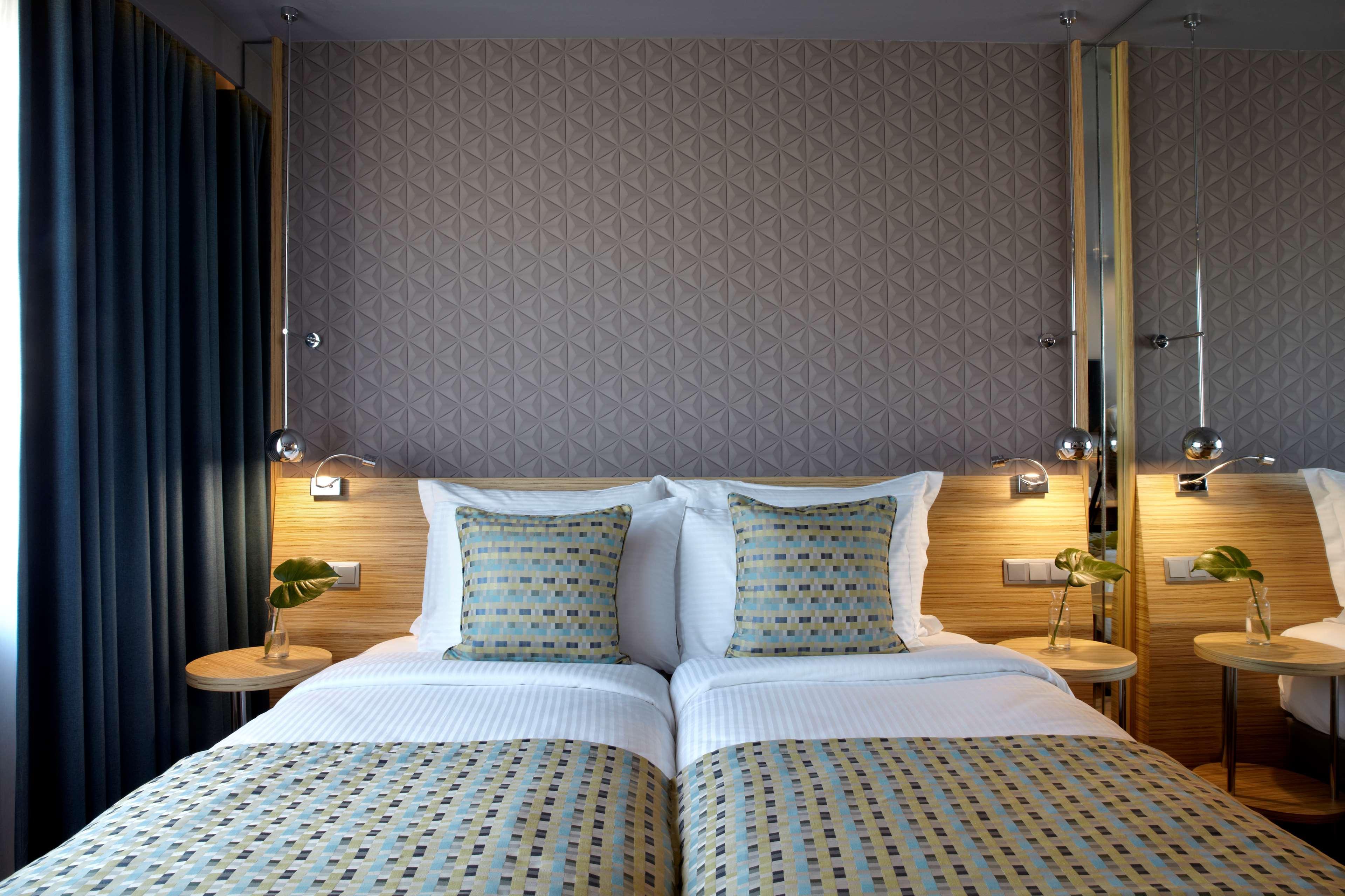 Hotel Wyndham Grand Atene Esterno foto A room at the hotel